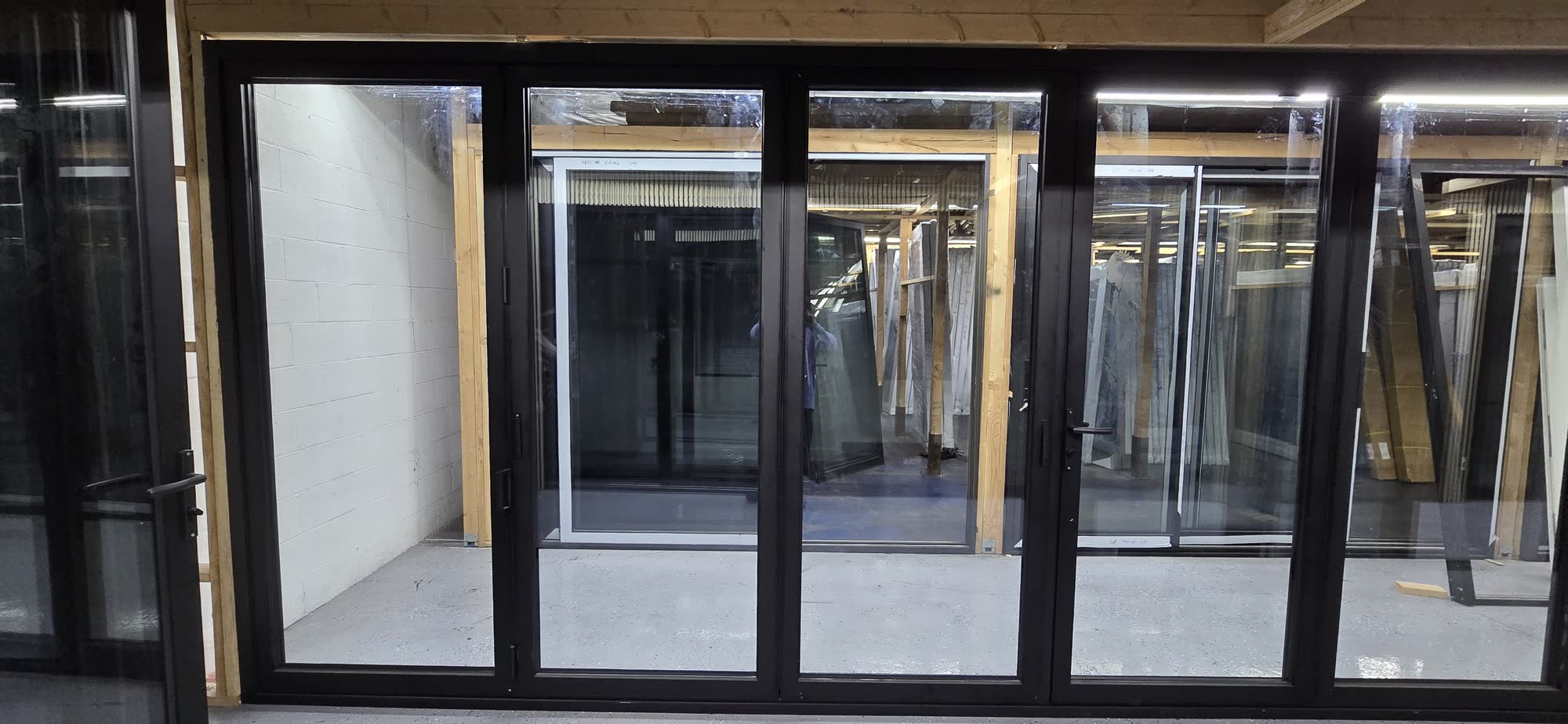 Wide aluminum bi-fold door system closed